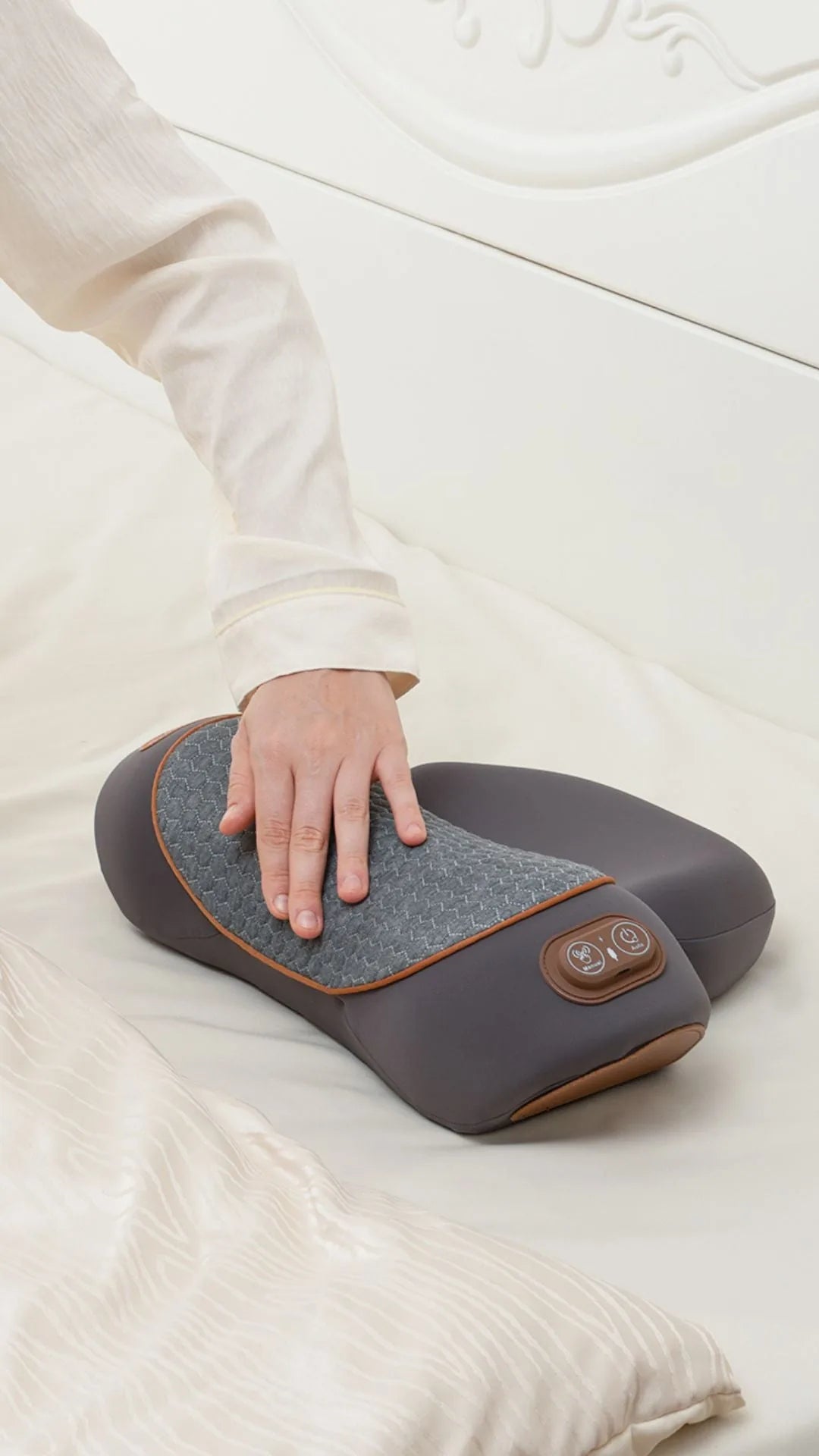 A hand resting on the RestWell Pillow